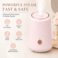 Pink portable facial steamer with PTC fast heating, 60 ml water tank, and overheating protection