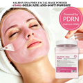 Salmon DNA PDRN Advanced Skin Repair Jelly Mask Powder pink peel-off mask being applied to model's face showing delicate soft powder texture