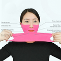 Model wearing pink V-line lifting hydrogel face mask showing directional lift zones including cheeks, chin and neck